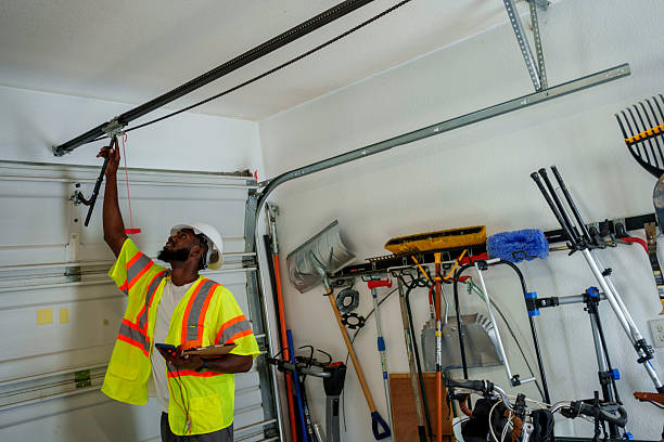 Professional Garage Door Panel Replacement technician working in Mounds, OK